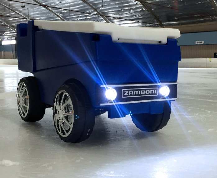 Remote-controlled Zamboni machine cooler with LED headlights, Bluetooth speakers, and USB charging port holding 24+ cans of ice