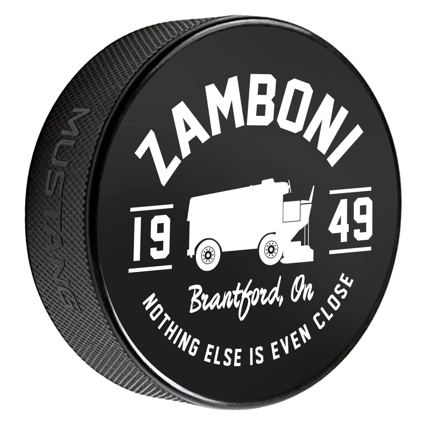 Zamboni Brantford Canada limited-edition hockey puck with Zamboni silhouette logo and bold white print