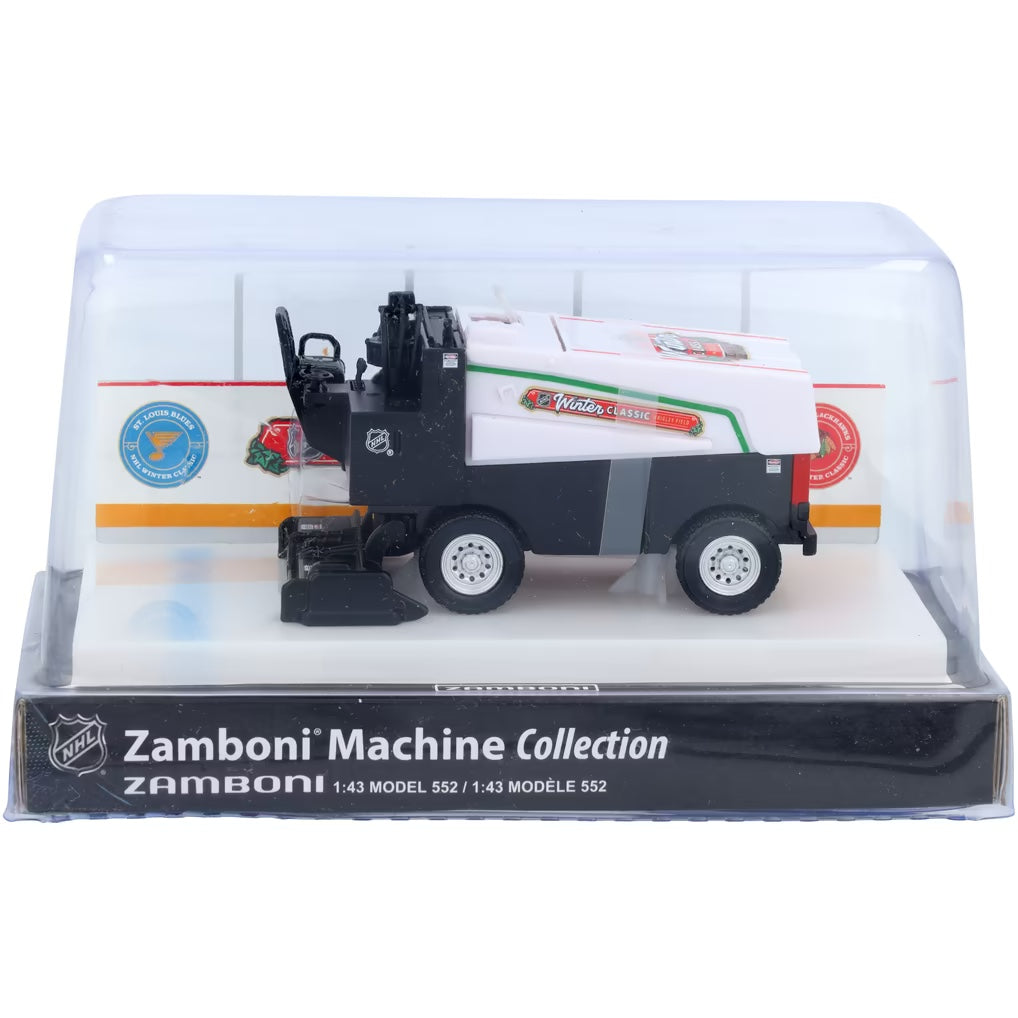 Die-cast Zamboni collectible in black and white with printed graphics, displayed under a clear arena-style cover; Adult Zamboni Ride-Along Costume.
