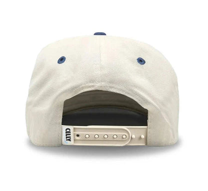Cotton snapback cap in cream with a washed navy brim, adjustable white snap closure; Adult Zamboni Ride-Along Costume.
