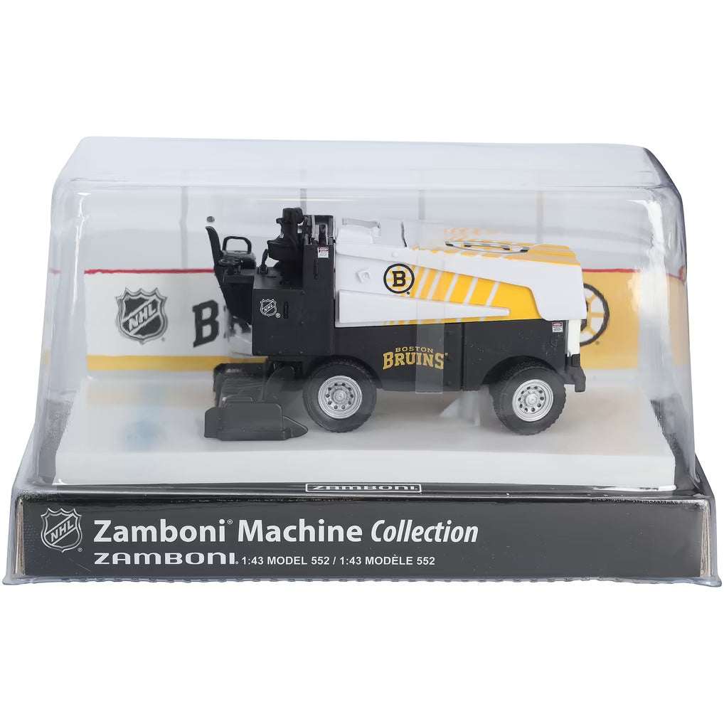 Die-cast Zamboni collectible in black, white and gold Boston Bruins graphics, displayed in a clear arena-style case; Adult Zamboni Ride-Along Costume is not shown.