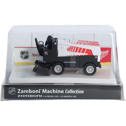 Die-cast Zamboni collectible, black and white with red Detroit Red Wings graphics, in a clear display case; Adult Zamboni Ride-Along Costume.